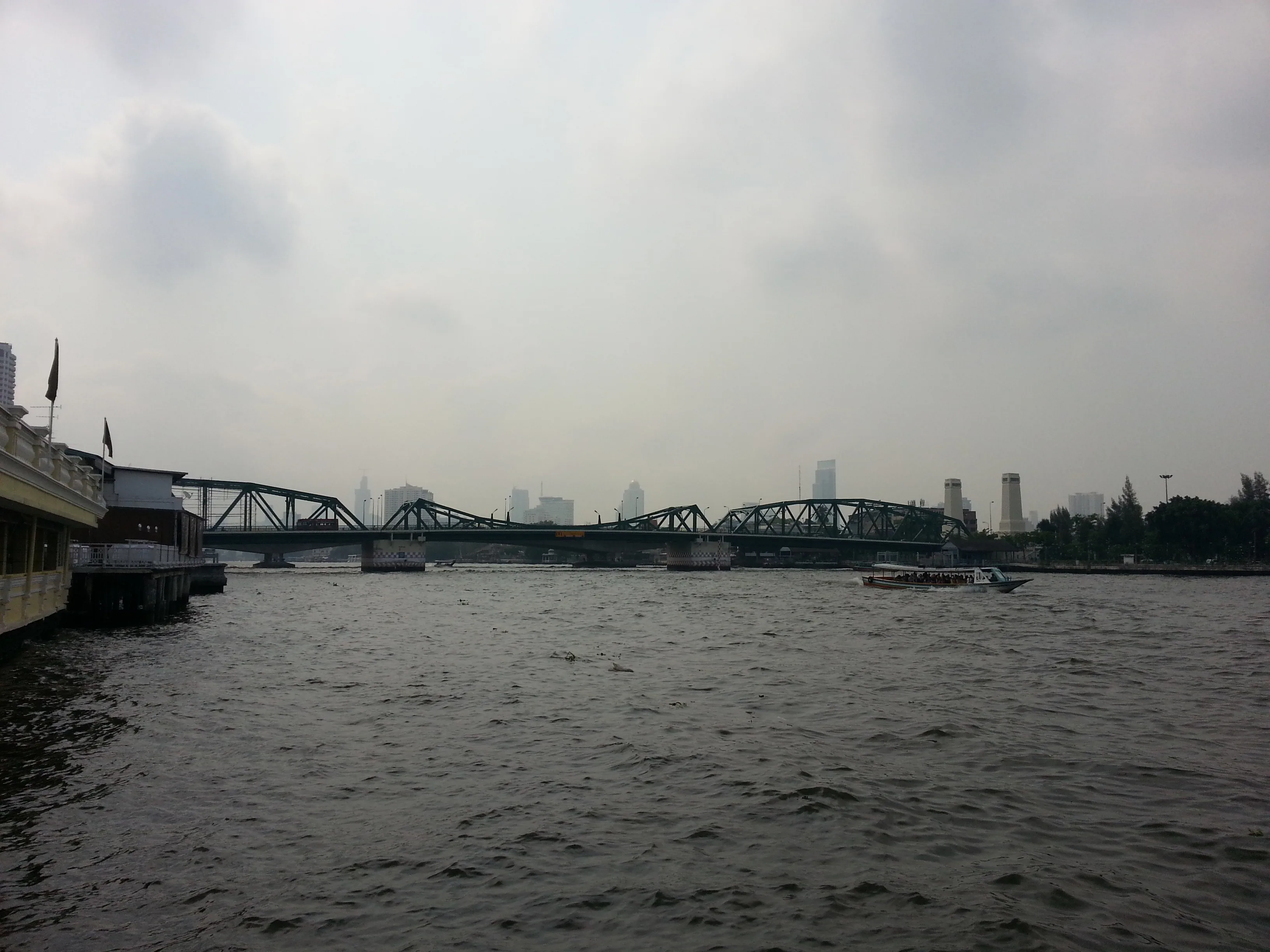 Memorial Bridge across the Chao Phraya, seen in daylight from the river edge