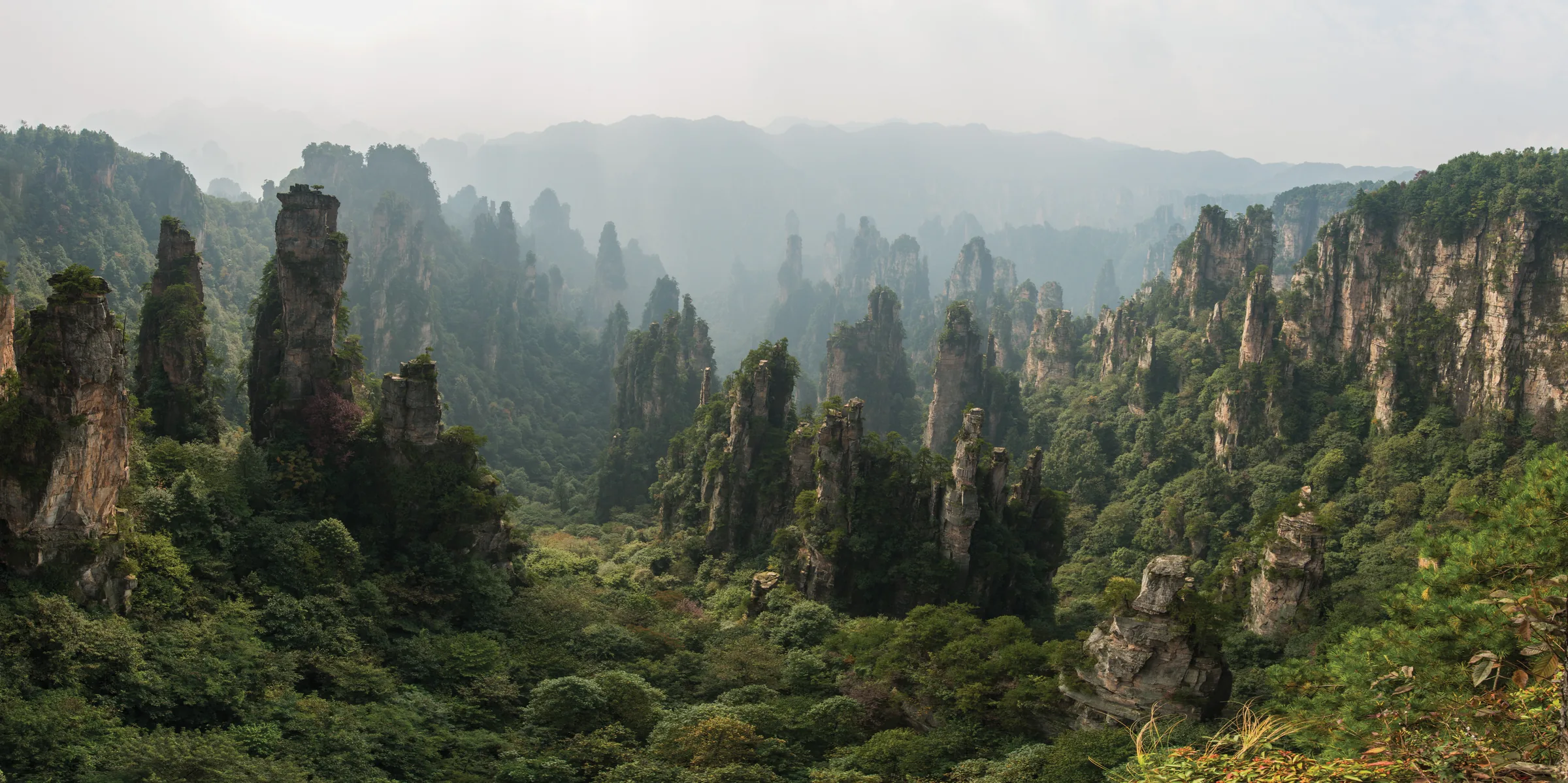 Sandstone peak forest and cloud at Tianzi Mountain in Wulingyuan